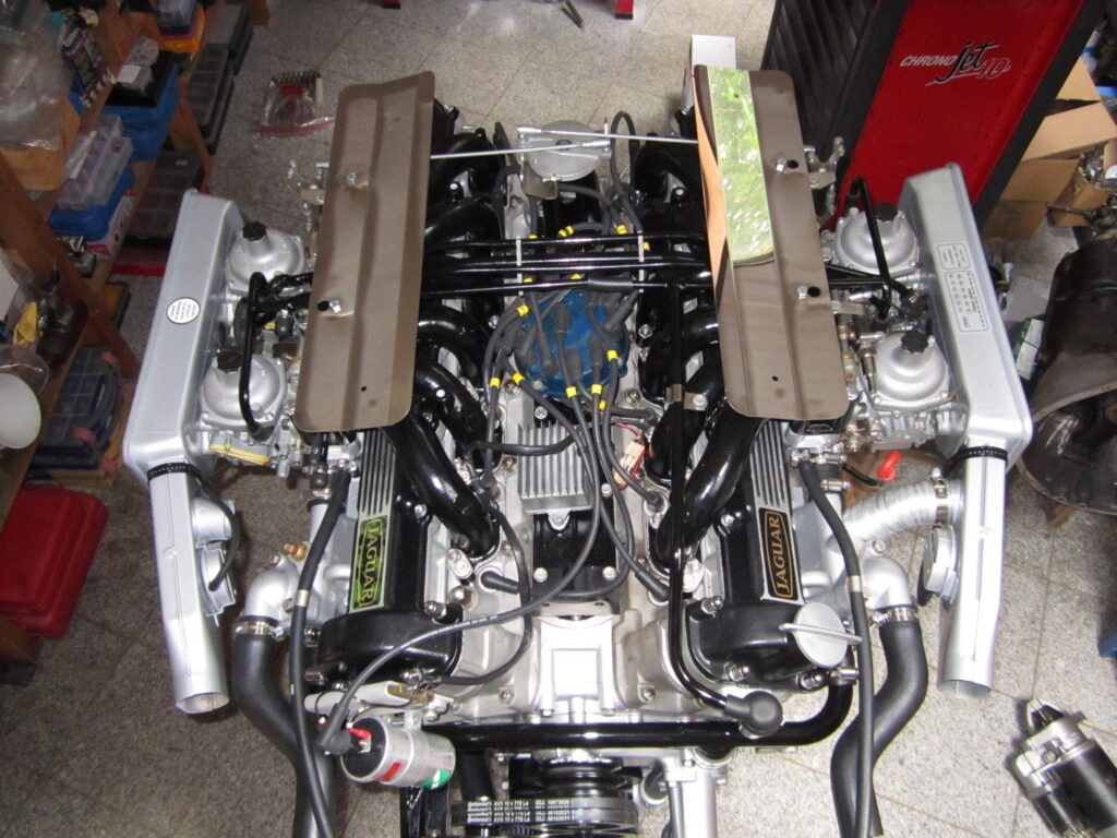 Jaguar E-Type engine. Top view of fully restored V12 engine.