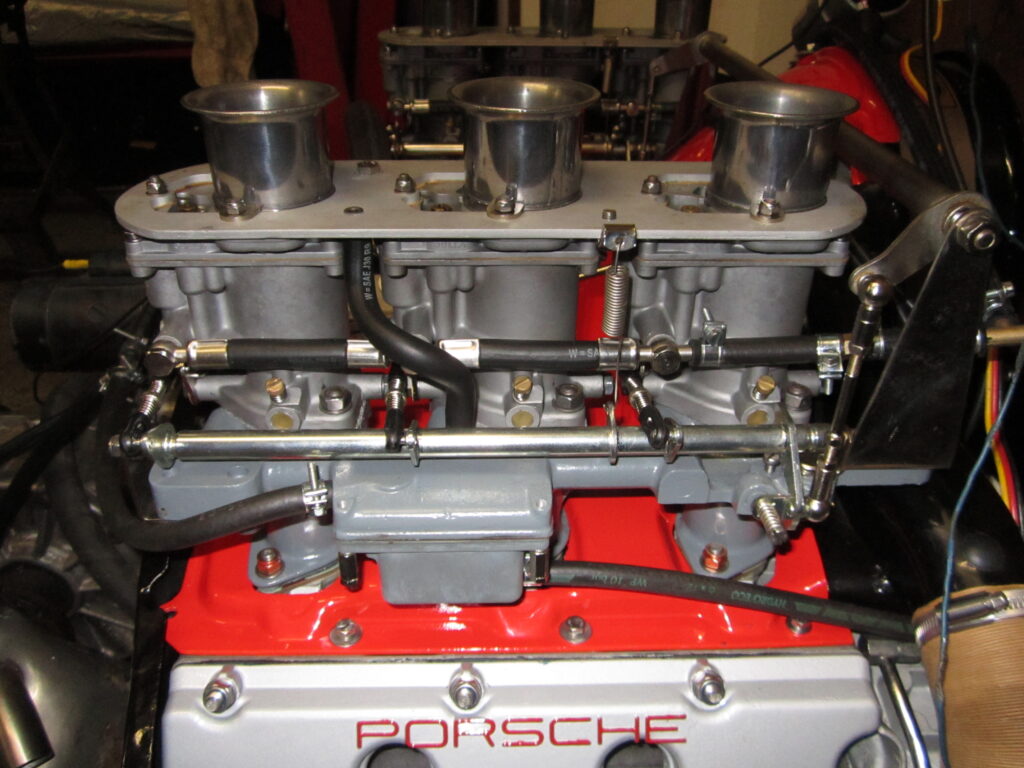 Porsche 911 engine. Side view of restored carburettors.